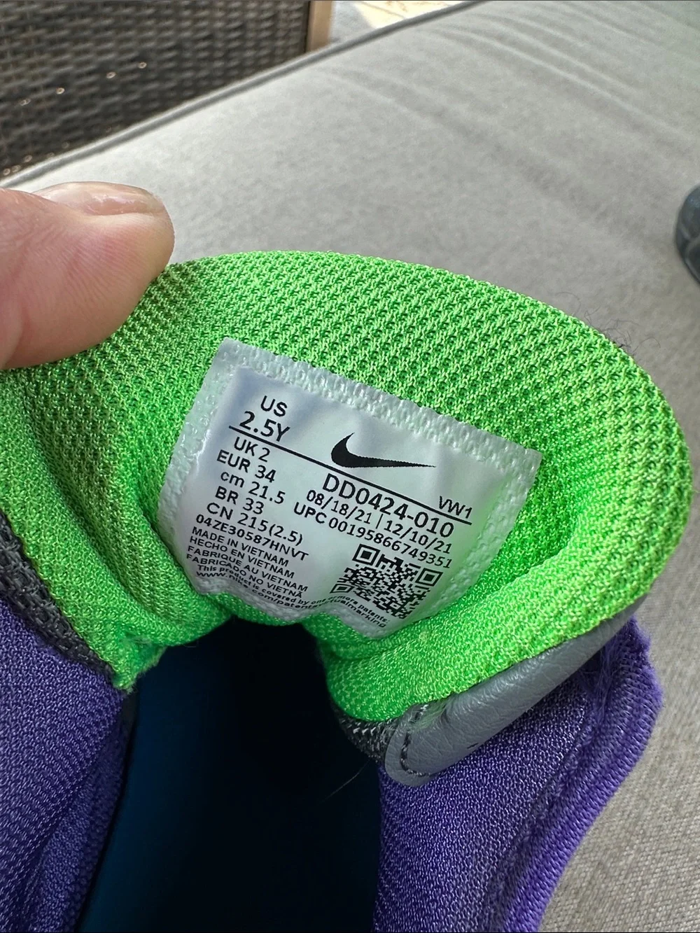 Nike Black Sneakers with Purple Lining and Green Swoosh